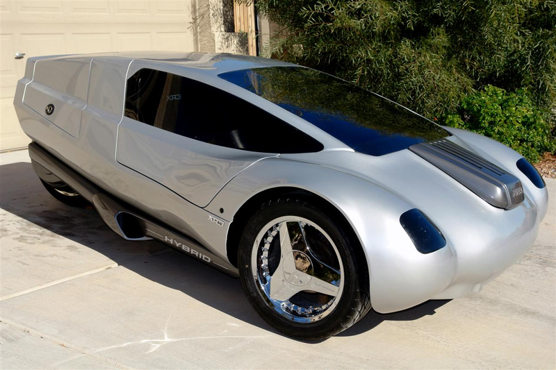 Illustration for article titled 125 MPG Diesel-Electric Three-Wheeled Car Headed For Production